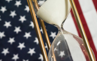 Government,Shutdown,,Hourglass,With,American,Flag